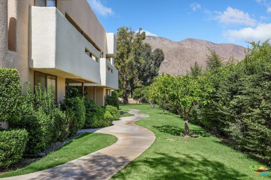 1268 Ramon Road, Unit 60 Palm Springs, CA 92264 - Photo 4 of 30 a view of a house with a yard