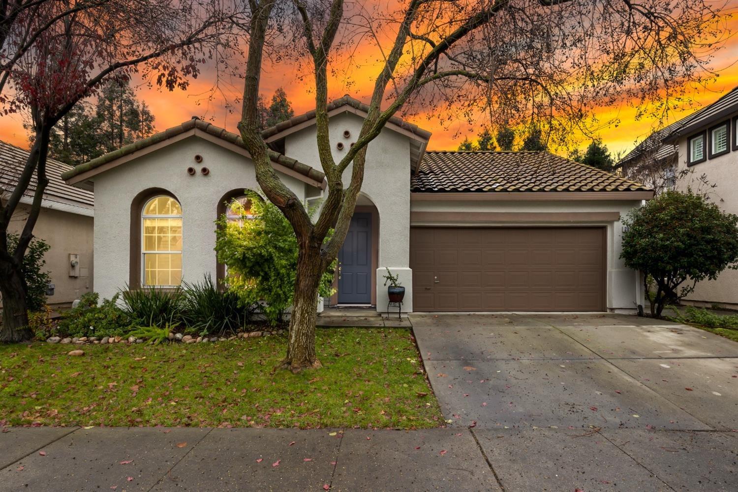 2020 Fenmore Way Sacramento, CA 95835 - Photo 1 of 23 a front view of a house with garden