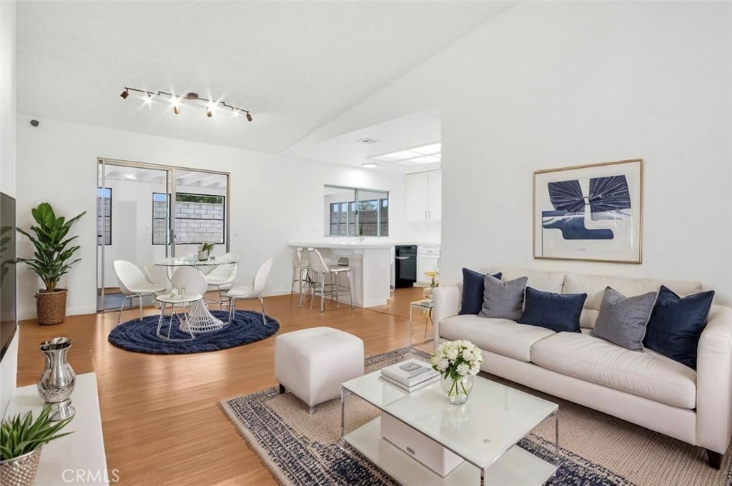 1012 Lightcap Street Lancaster, CA 93535 - Photo 11 of 33 a living room with furniture and a potted plant