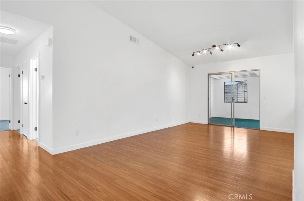 1012 Lightcap Street Lancaster, CA 93535 - Photo 16 of 33 a view of empty room with wooden floor