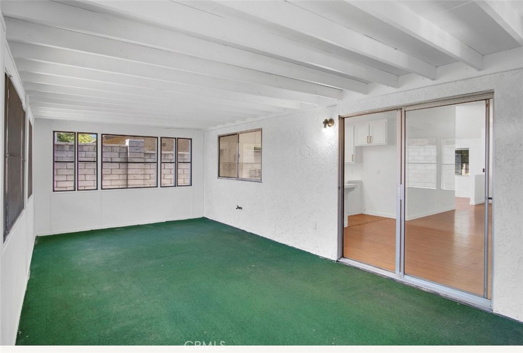 1012 Lightcap Street Lancaster, CA 93535 - Photo 23 of 33 wooden floor in an empty room with a window