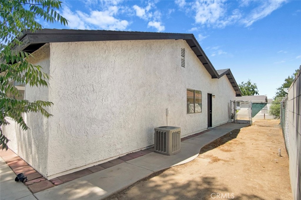 1012 Lightcap Street Lancaster, CA 93535 - Photo 27 of 33 a front view of a house with a yard