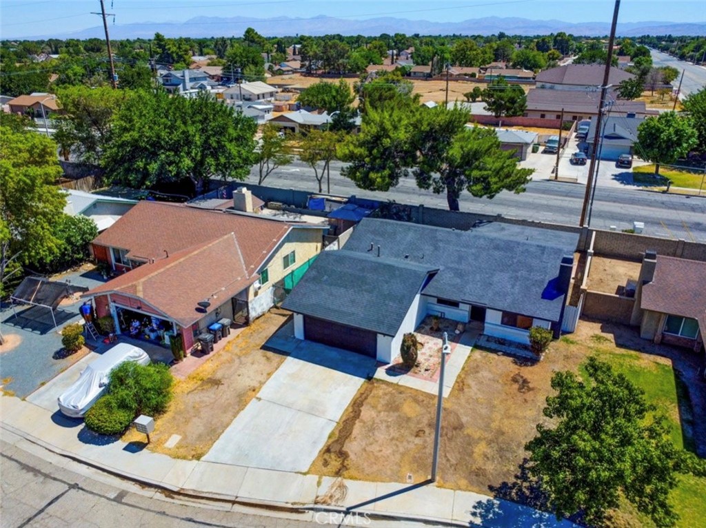 1012 Lightcap Street Lancaster, CA 93535 - Photo 28 of 33 an aerial view of a house with a yard basket ball court and outdoor seating