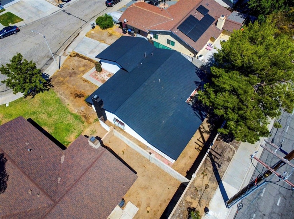 1012 Lightcap Street Lancaster, CA 93535 - Photo 30 of 33 an aerial view of a house with a yard