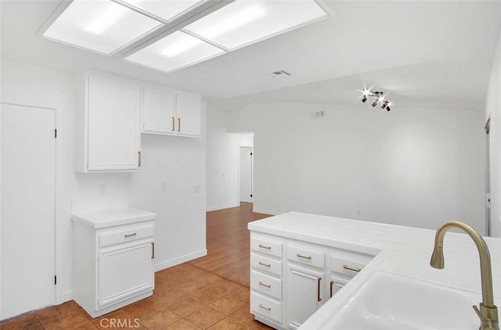 1012 Lightcap Street Lancaster, CA 93535 - Photo 5 of 33 a bathroom with a sink and a mirror