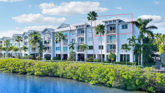 a front view of building with yard