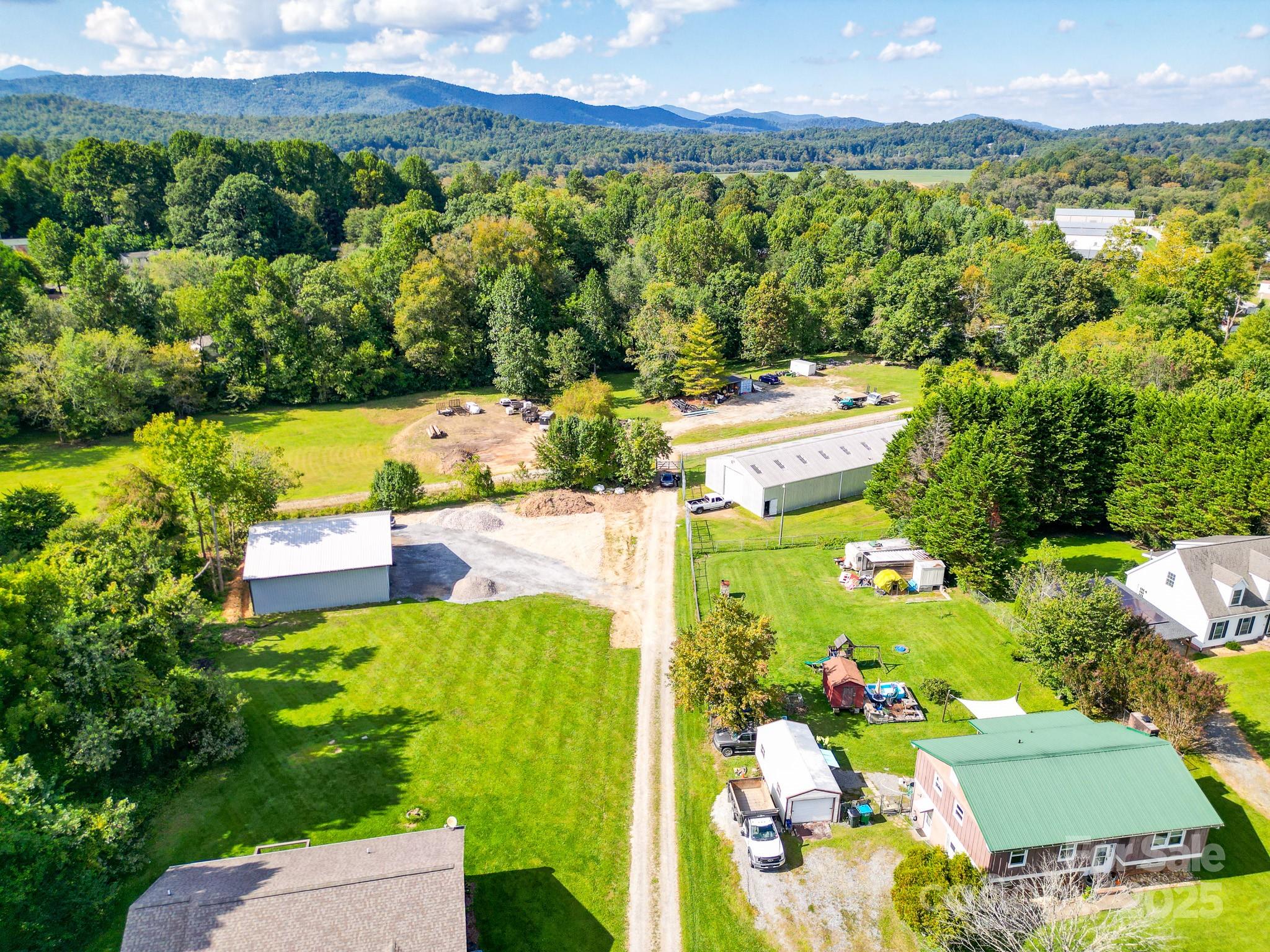 0 Morgan Road Hendersonville, NC 28739 - Photo 9 of 10 a view of a swimming pool with a garden
