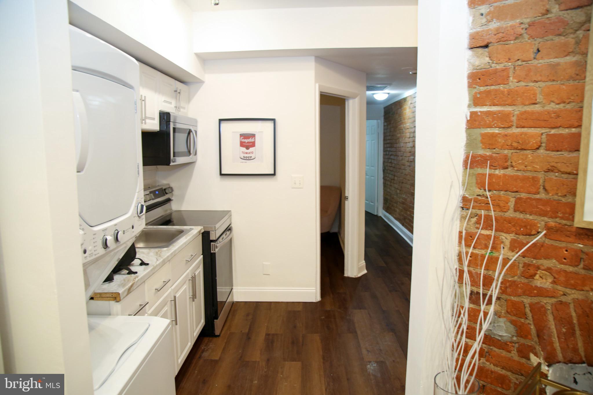 1345 1st Street Northwest, Unit 1 Washington, DC 20001 - Photo 4 of 9 Charming kitchen with modern finishes.