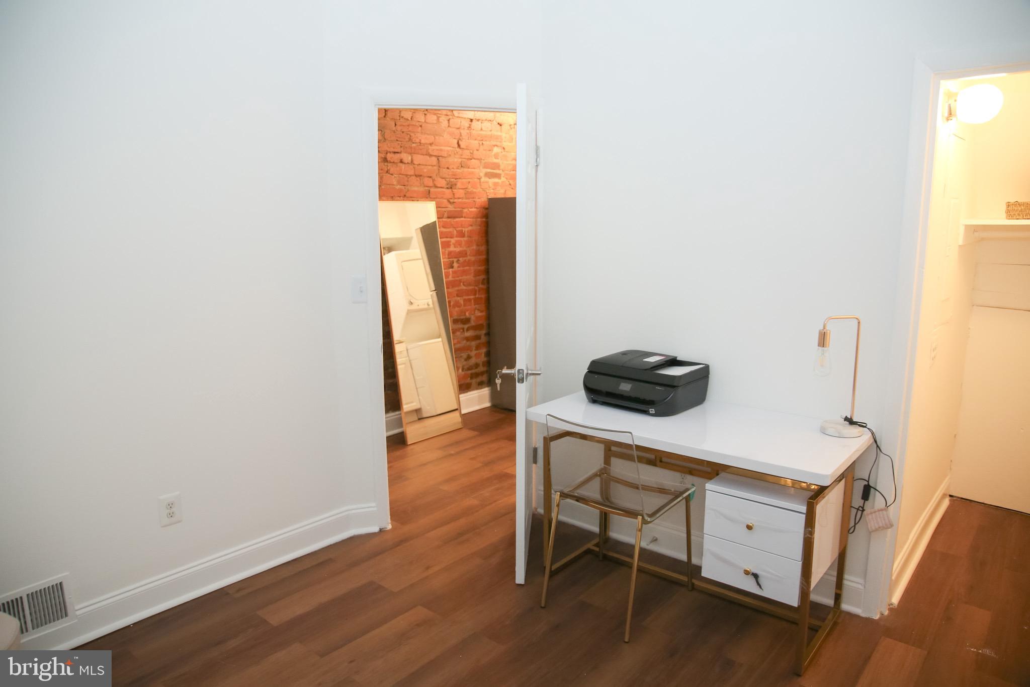 1345 1st Street Northwest, Unit 1 Washington, DC 20001 - Photo 9 of 9 Bright and airy workspace with modern touches.