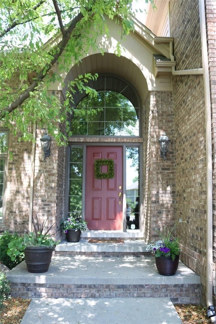 1983 Blue Grass Court Rochester, MI 48306 - Photo 9 of 46 THE FRONT DOOR OPENS TO A SPACIOUS 2 STORY FOYER