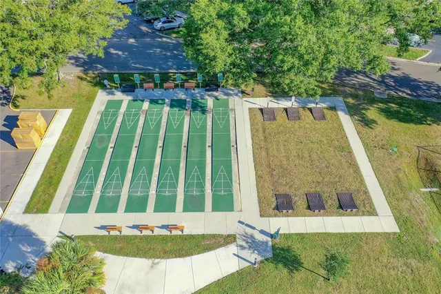 a view of yard with swimming pool and outdoor seating