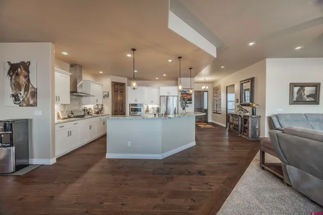 a kitchen with lots of counter space and a sink