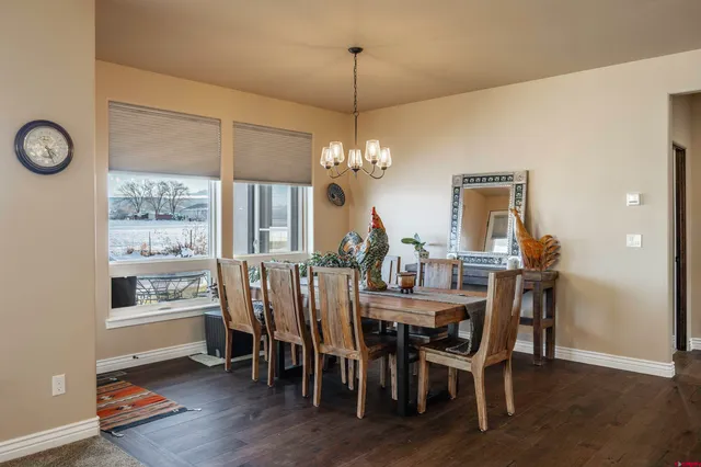 a bedroom with a bed couch and window
