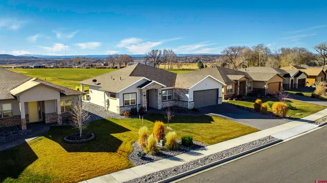 a view of a house with swimming pool