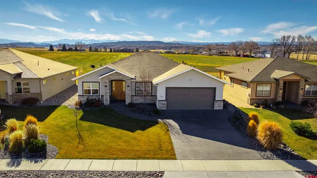 a view of swimming pool with seating area