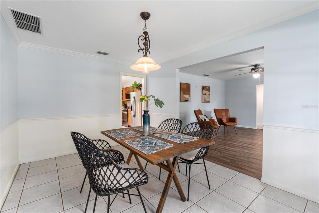 8024 Northwest 2nd Court Gainesville, FL 32607 - Photo 7 of 40 a view of a livingroom and dining room