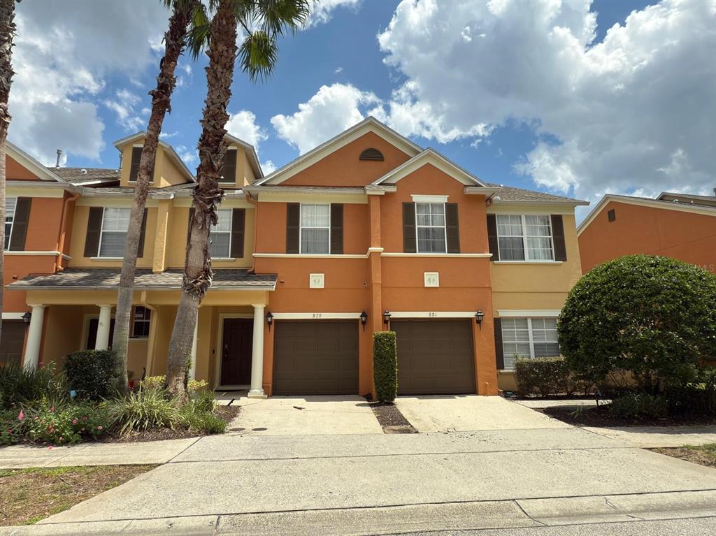 879 Assembly Court Reunion, FL 34747 - Photo 2 of 46 a front view of a house