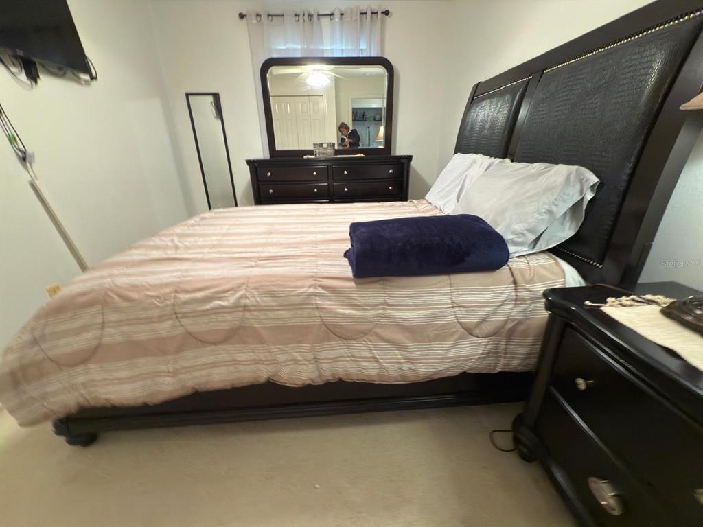 879 Assembly Court Reunion, FL 34747 - Photo 34 of 46 a bathroom with a sink and a mirror