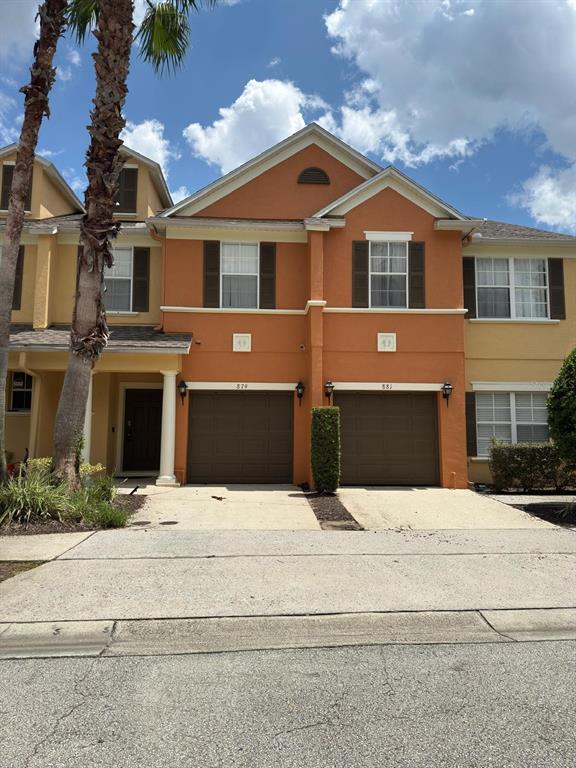 879 Assembly Court Reunion, FL 34747 - Photo 45 of 46 a front view of a house with yard