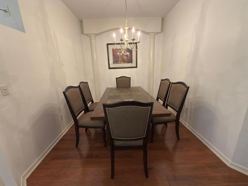 879 Assembly Court Reunion, FL 34747 - Photo 5 of 46 a view of a dining room with furniture and window