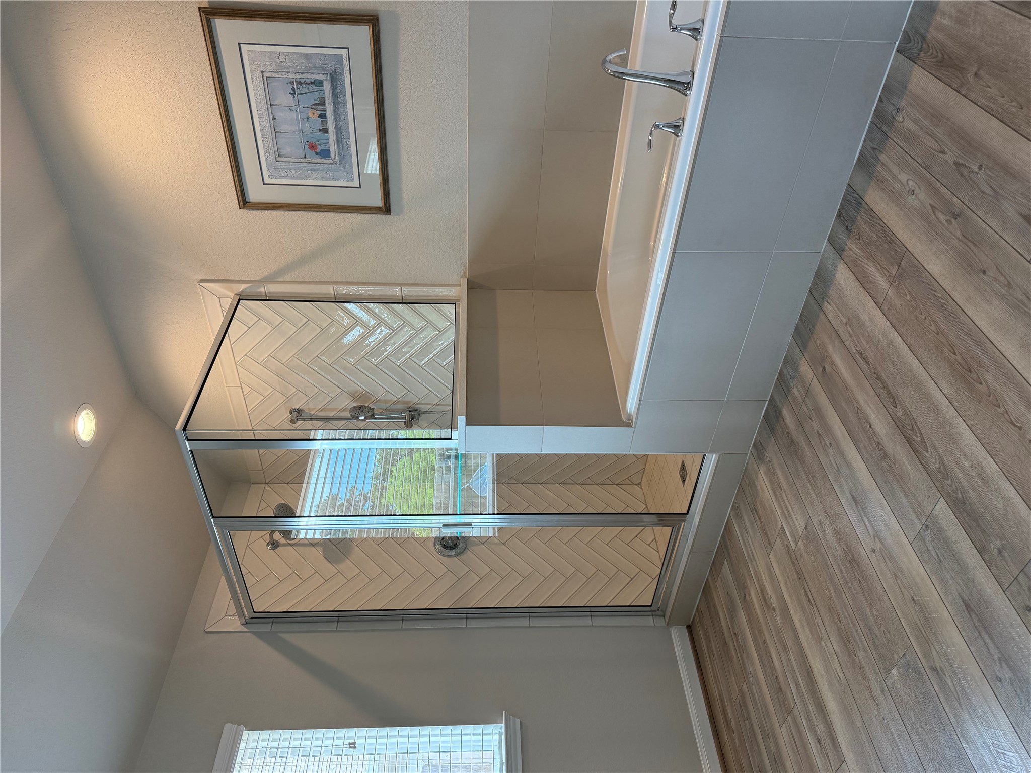 2336 Hagerman Road Conroe, TX 77384 - Photo 22 of 35 a bathroom with a bathtub and a shower