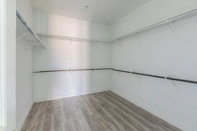 a view of an empty walk in closet