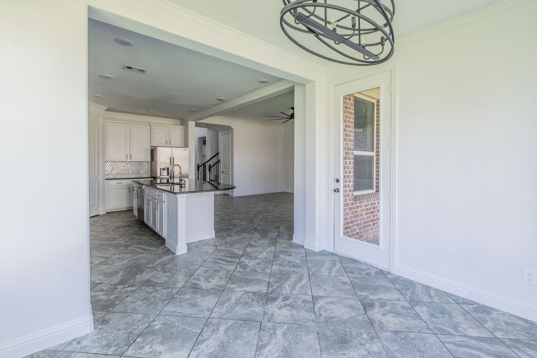 4806 Timber Gate Court Rosharon, TX 77583 - Photo 22 of 36 a view of a hallway with wooden shelves