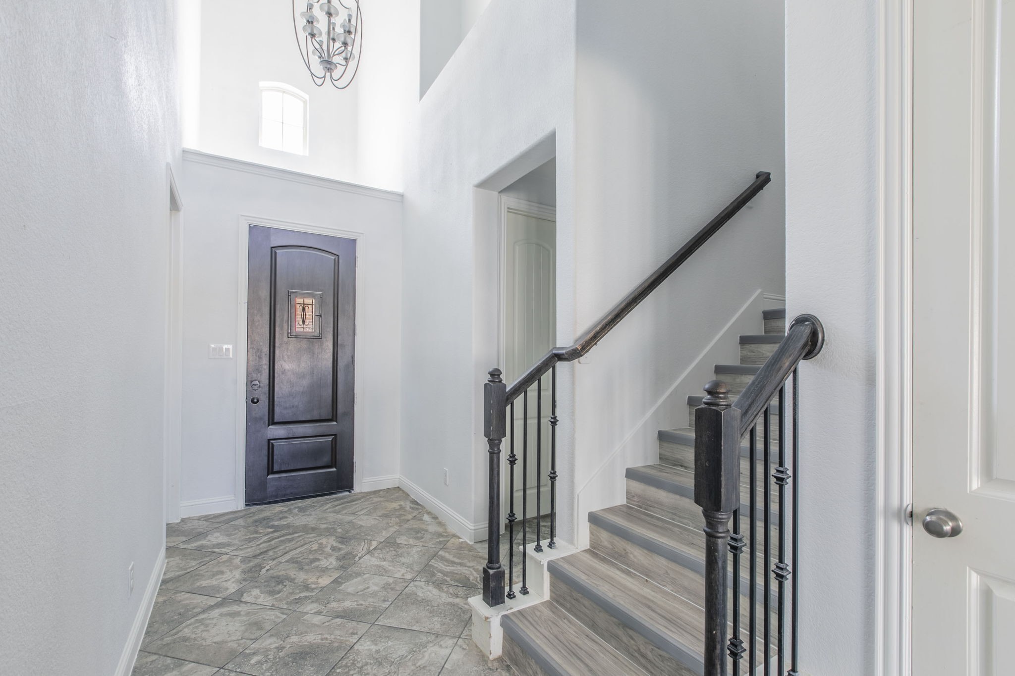 4806 Timber Gate Court Rosharon, TX 77583 - Photo 25 of 36 a view of entryway and hall with wooden floor