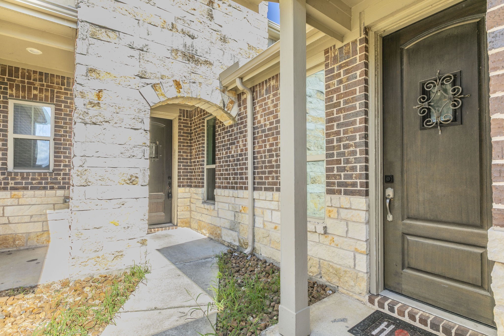 4806 Timber Gate Court Rosharon, TX 77583 - Photo 30 of 36 a front view of a house with a glass door