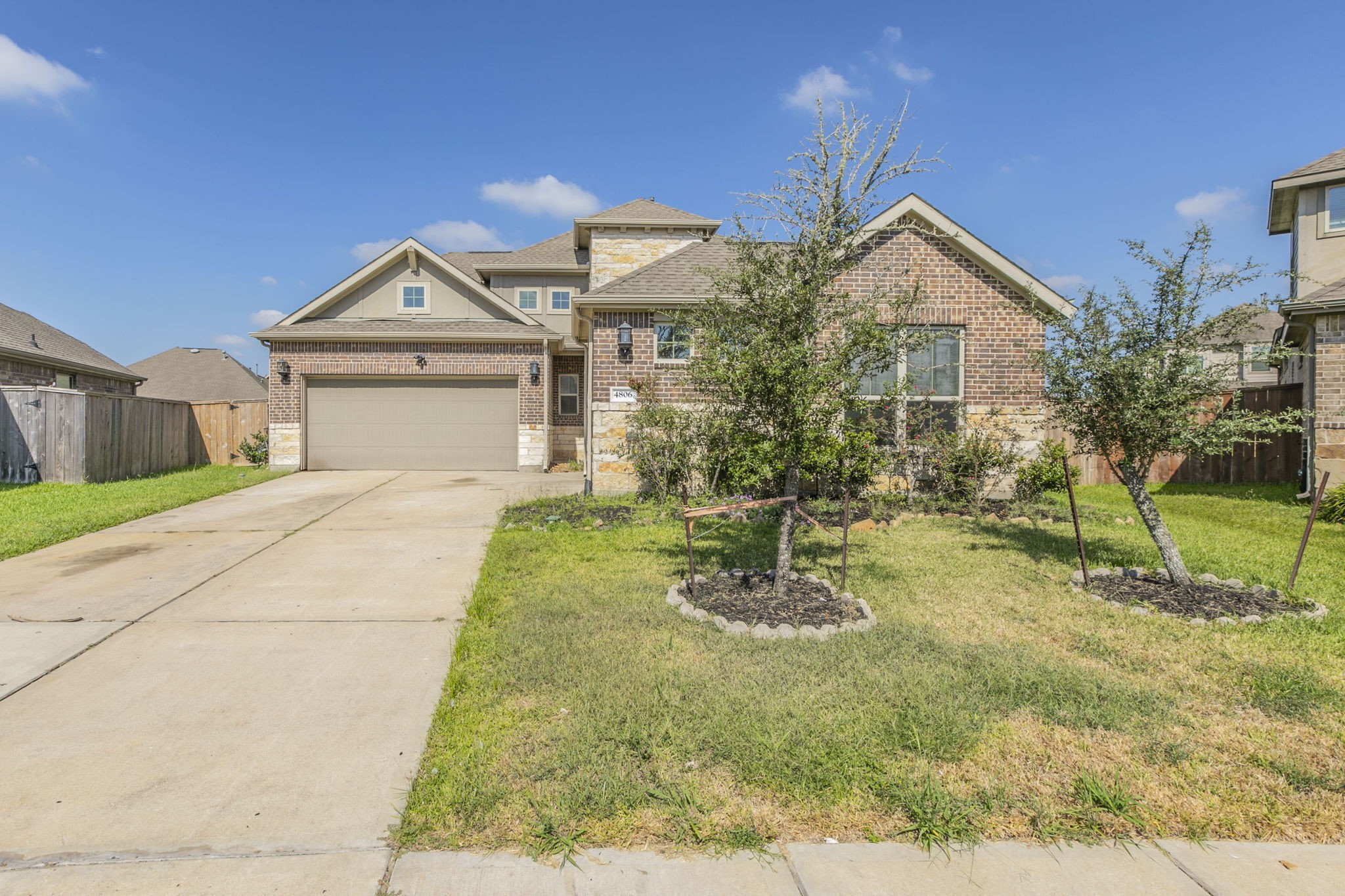 4806 Timber Gate Court Rosharon, TX 77583 - Photo 31 of 36 a front view of a house with garden