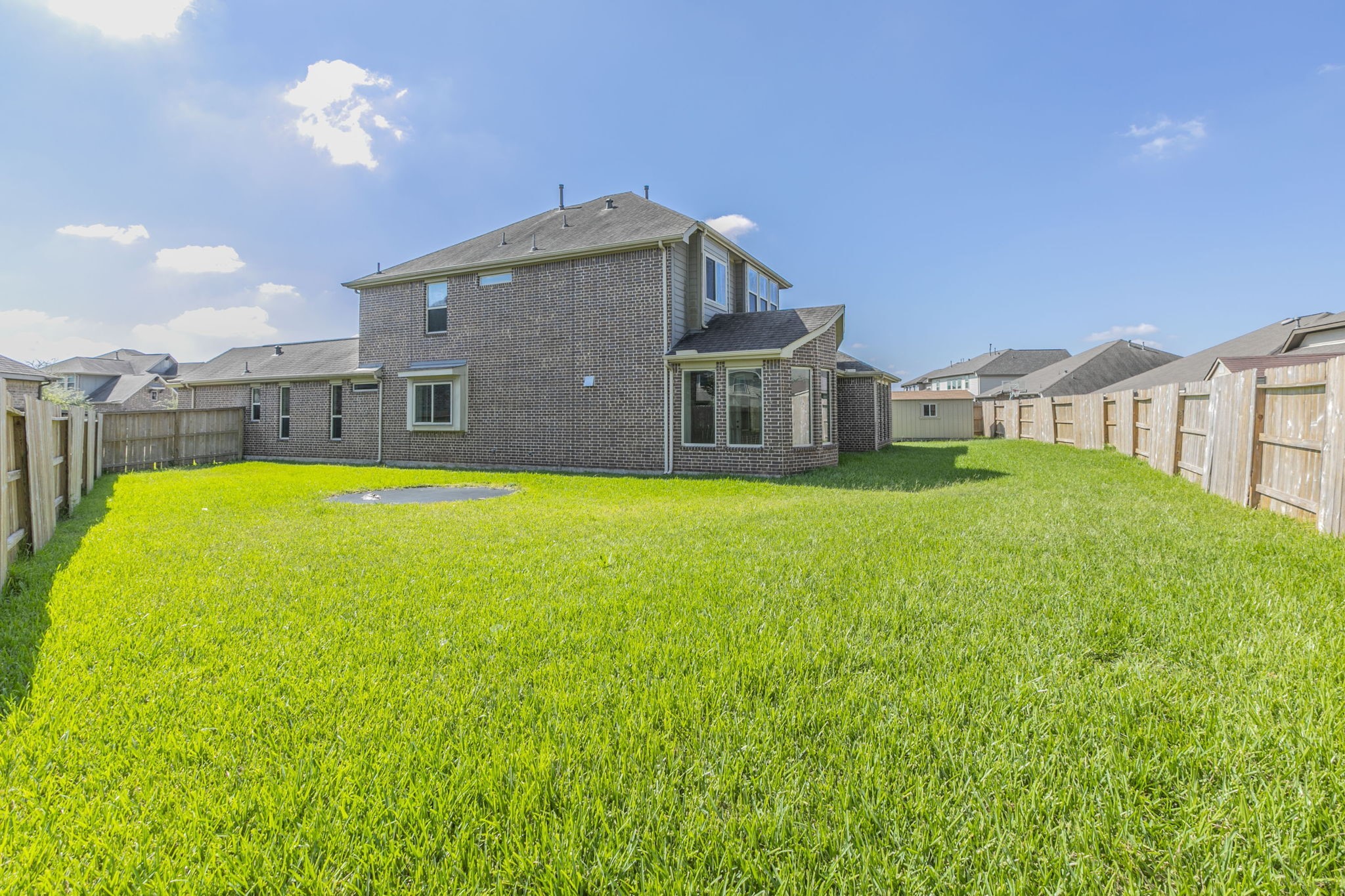 4806 Timber Gate Court Rosharon, TX 77583 - Photo 33 of 36 a view of a house with a yard and a large tree