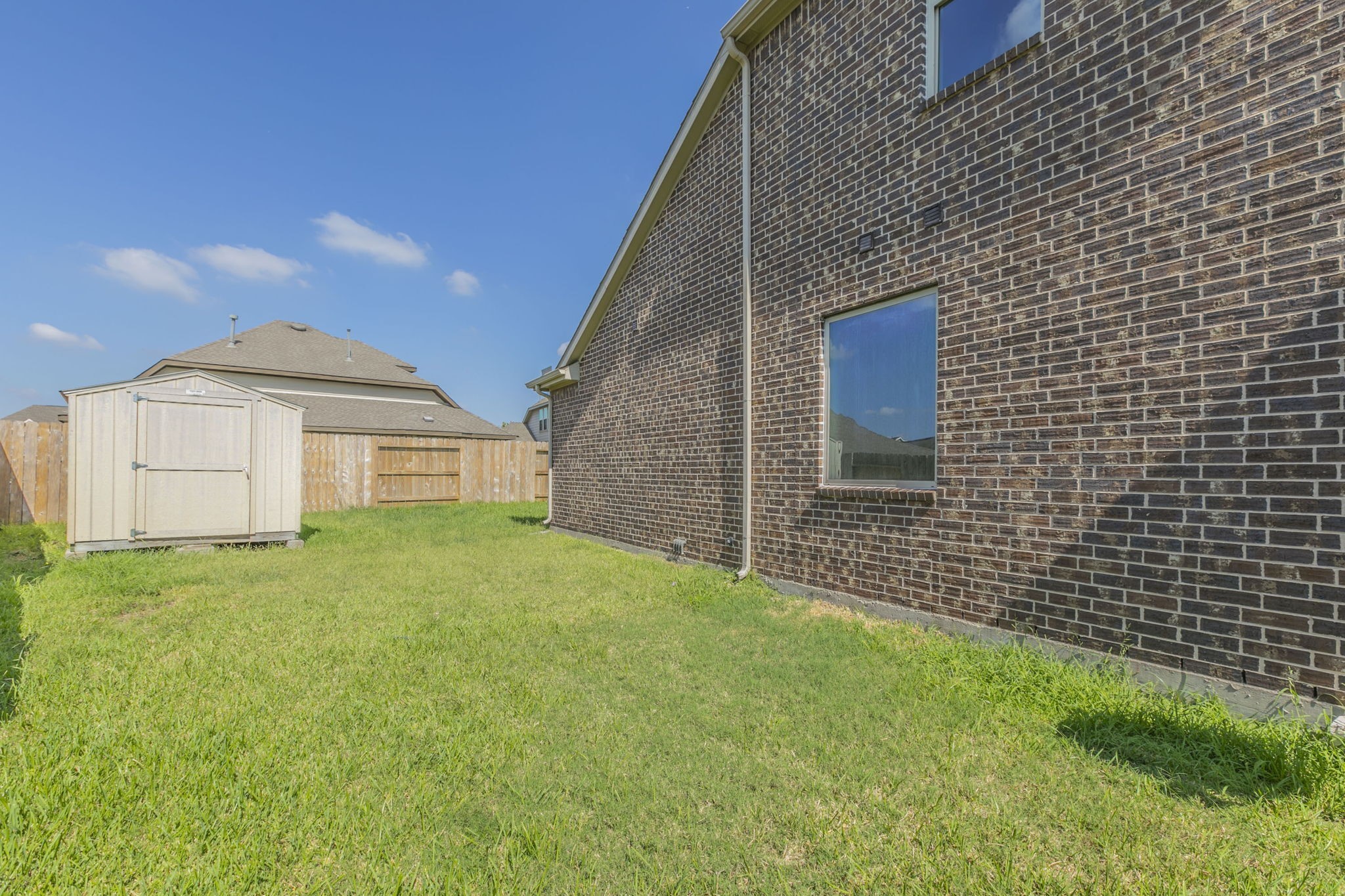 4806 Timber Gate Court Rosharon, TX 77583 - Photo 36 of 36 a view of a house with backyard and garden