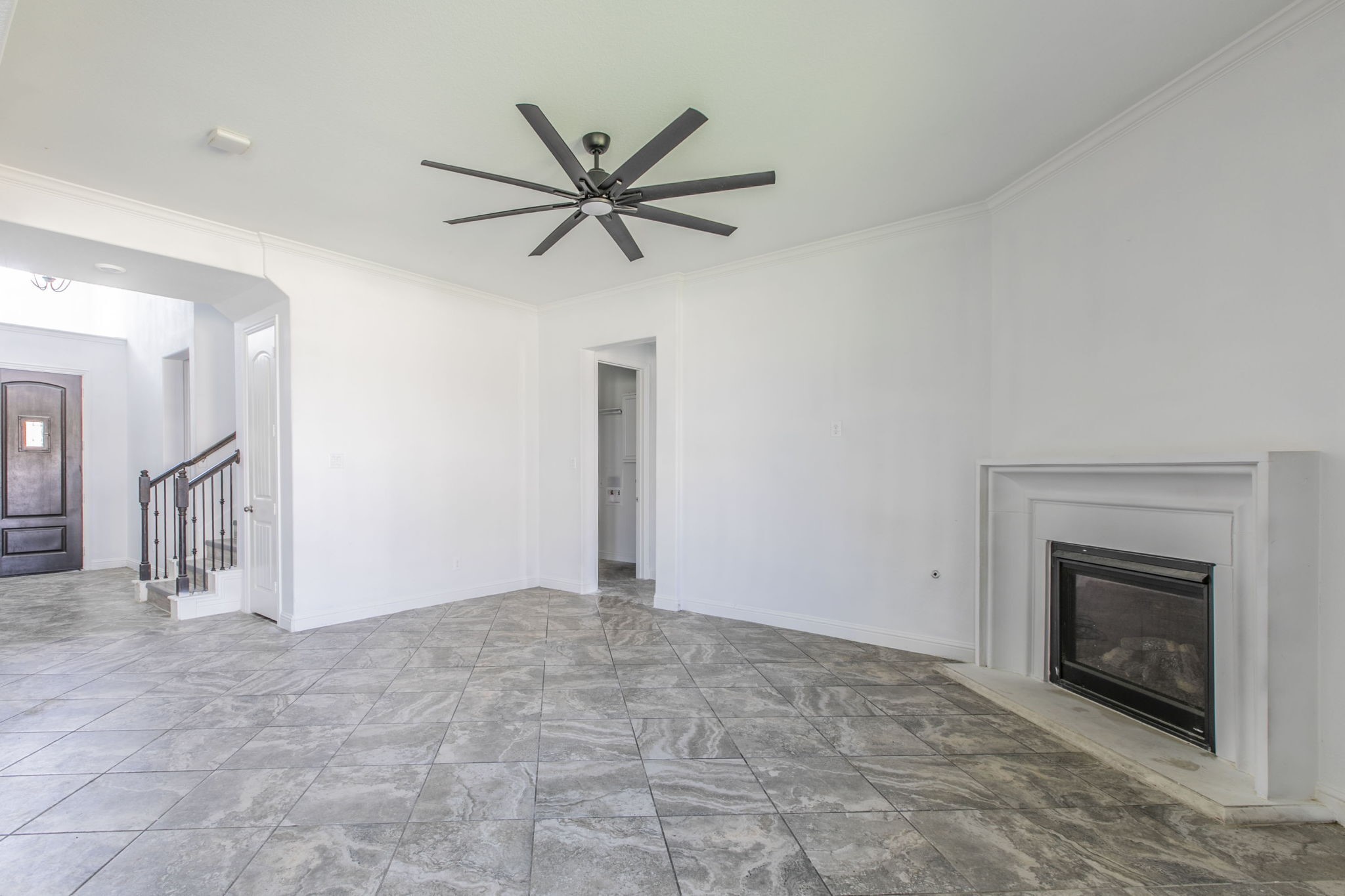 4806 Timber Gate Court Rosharon, TX 77583 - Photo 10 of 36 a view of an empty room and chandelier fan