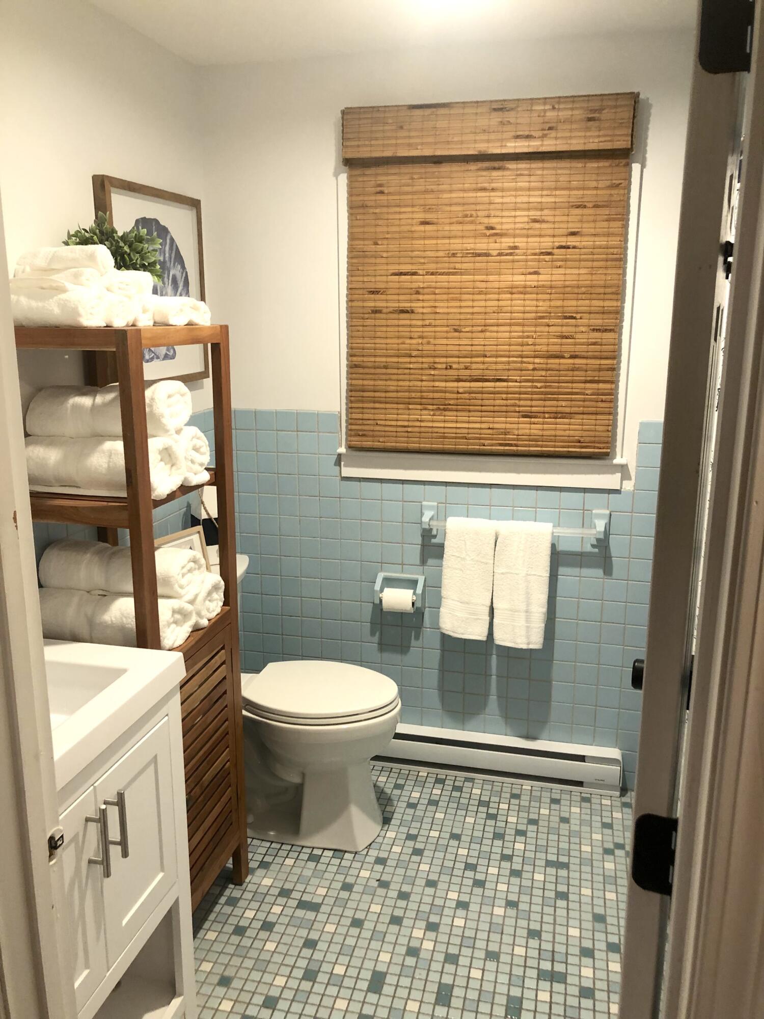 9 Bells Neck Road, Unit 10 West Harwich, MA 02671 - Photo 9 of 23 a bathroom with a toilet a sink and a shower