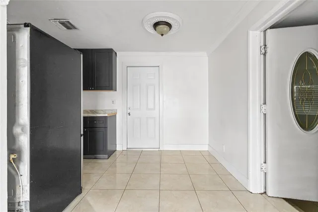 a view of a kitchen from the hallway