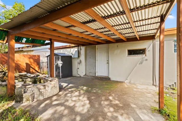 a view of a room with wooden walls