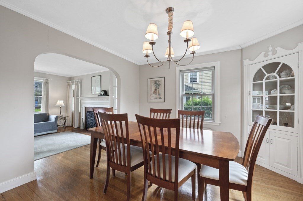 5 Auburndale Road Marblehead, MA 01945 - Photo 19 of 41 a view of a dining room with furniture wooden floor and chandelier