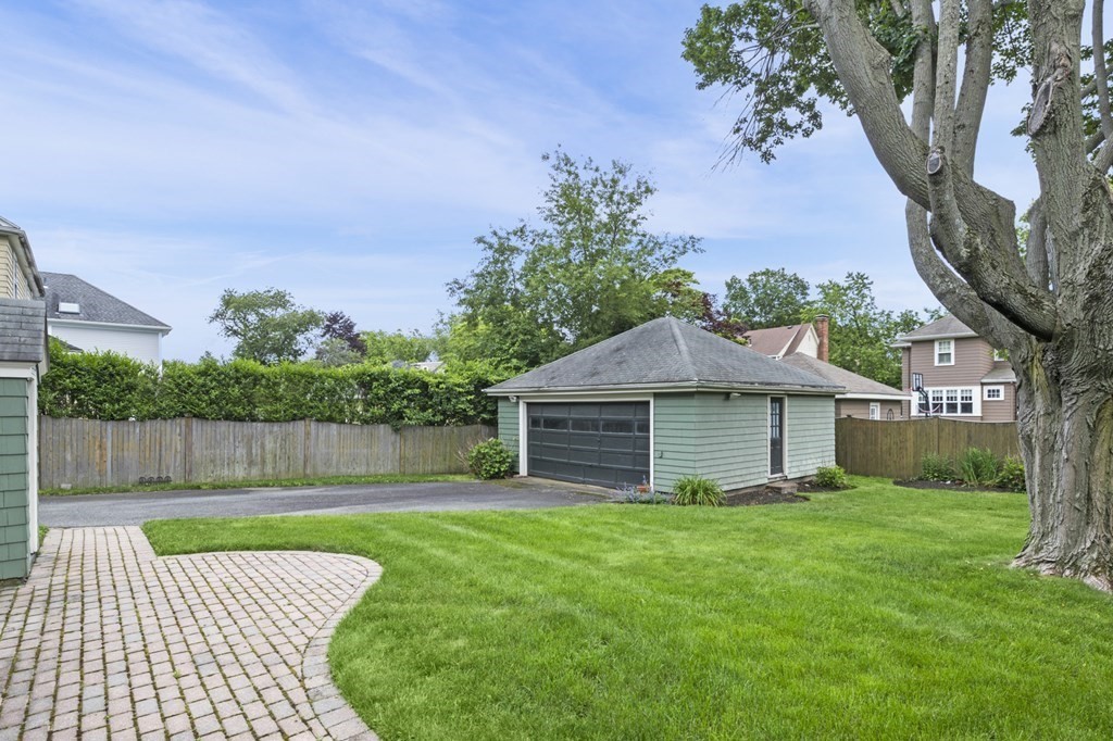 5 Auburndale Road Marblehead, MA 01945 - Photo 8 of 41 a front view of a house with a garden