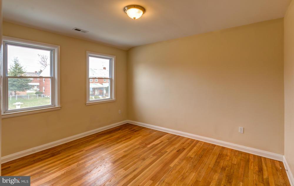 6146 Marlora Road Baltimore, MD 21239 - Photo 14 of 27 a view of a room with wooden floor and walls