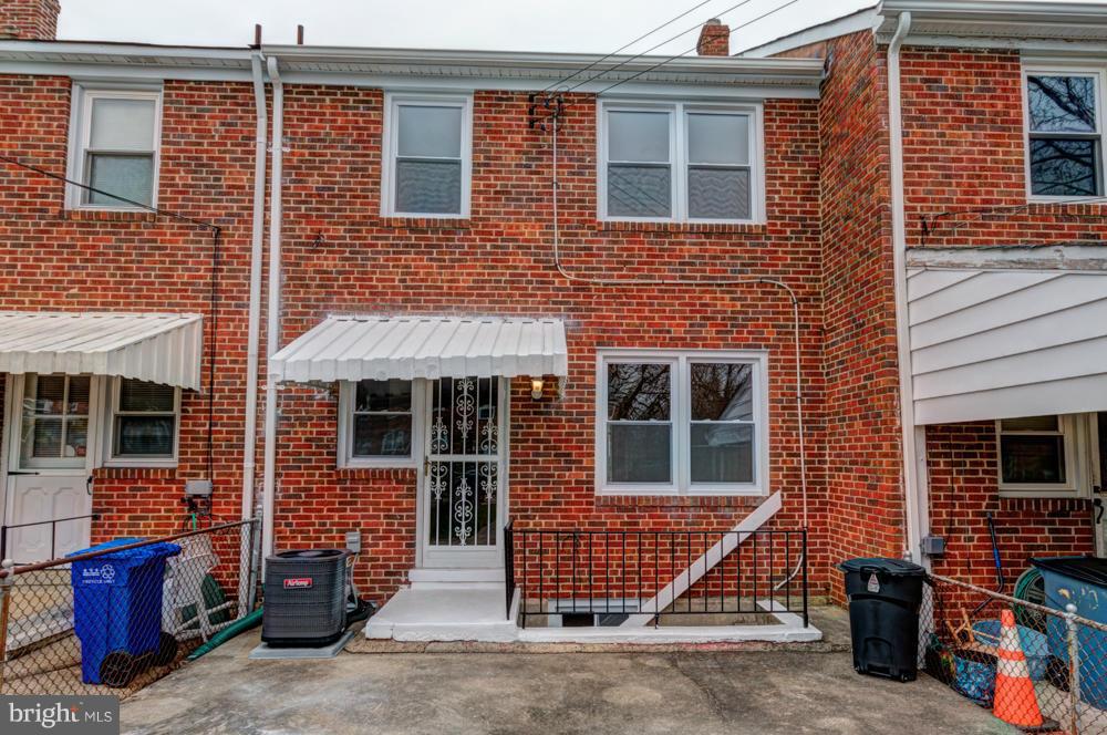 6146 Marlora Road Baltimore, MD 21239 - Photo 22 of 27 a front view of a house