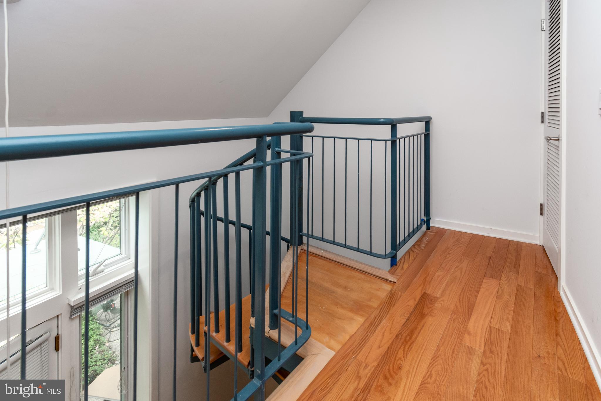 36 Moore Street, Unit 8 Princeton, NJ 08542 - Photo 12 of 35 a view of a hallway with wooden floor and staircase