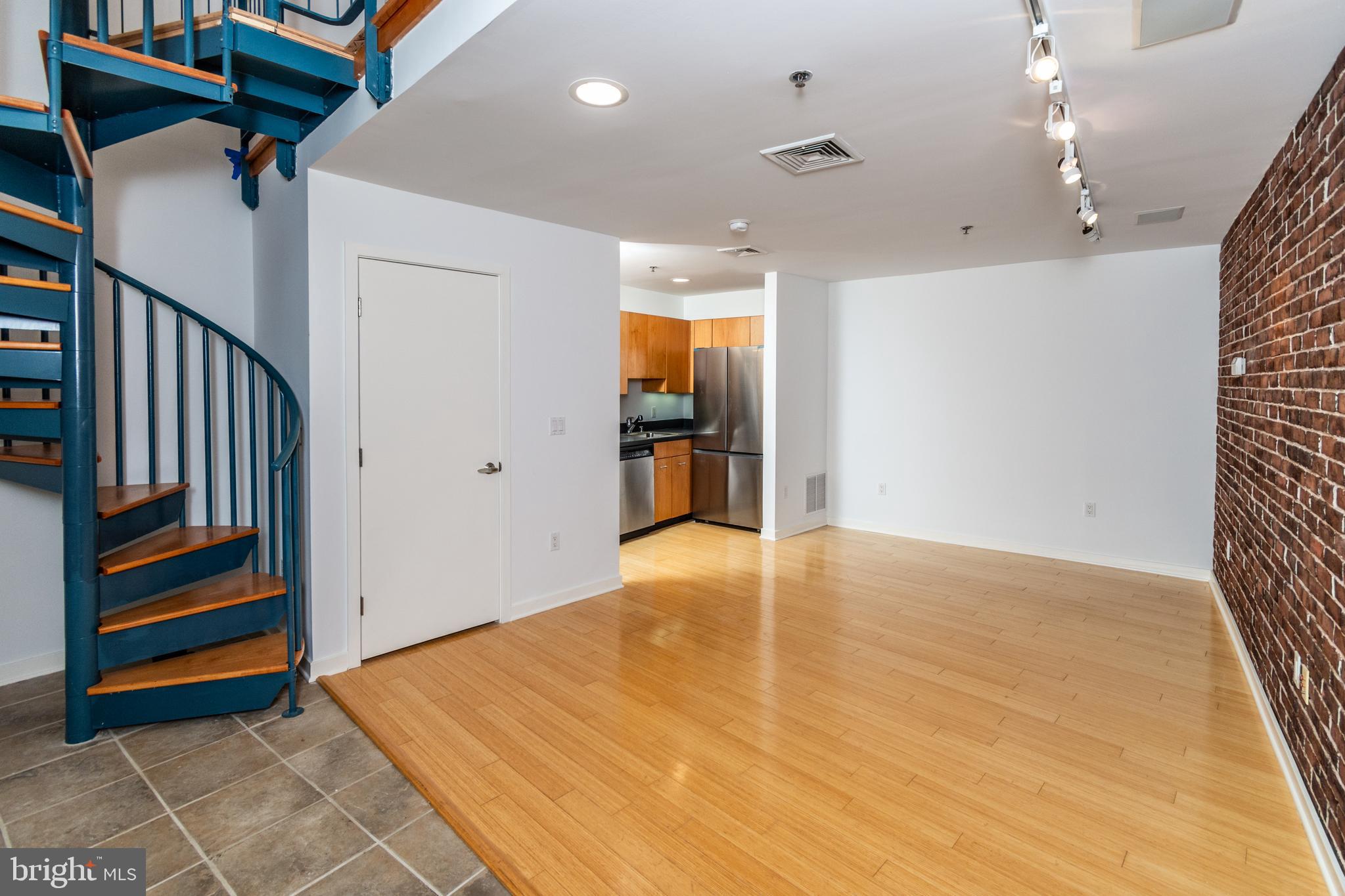 36 Moore Street, Unit 8 Princeton, NJ 08542 - Photo 28 of 35 wooden floor in an empty room with a window