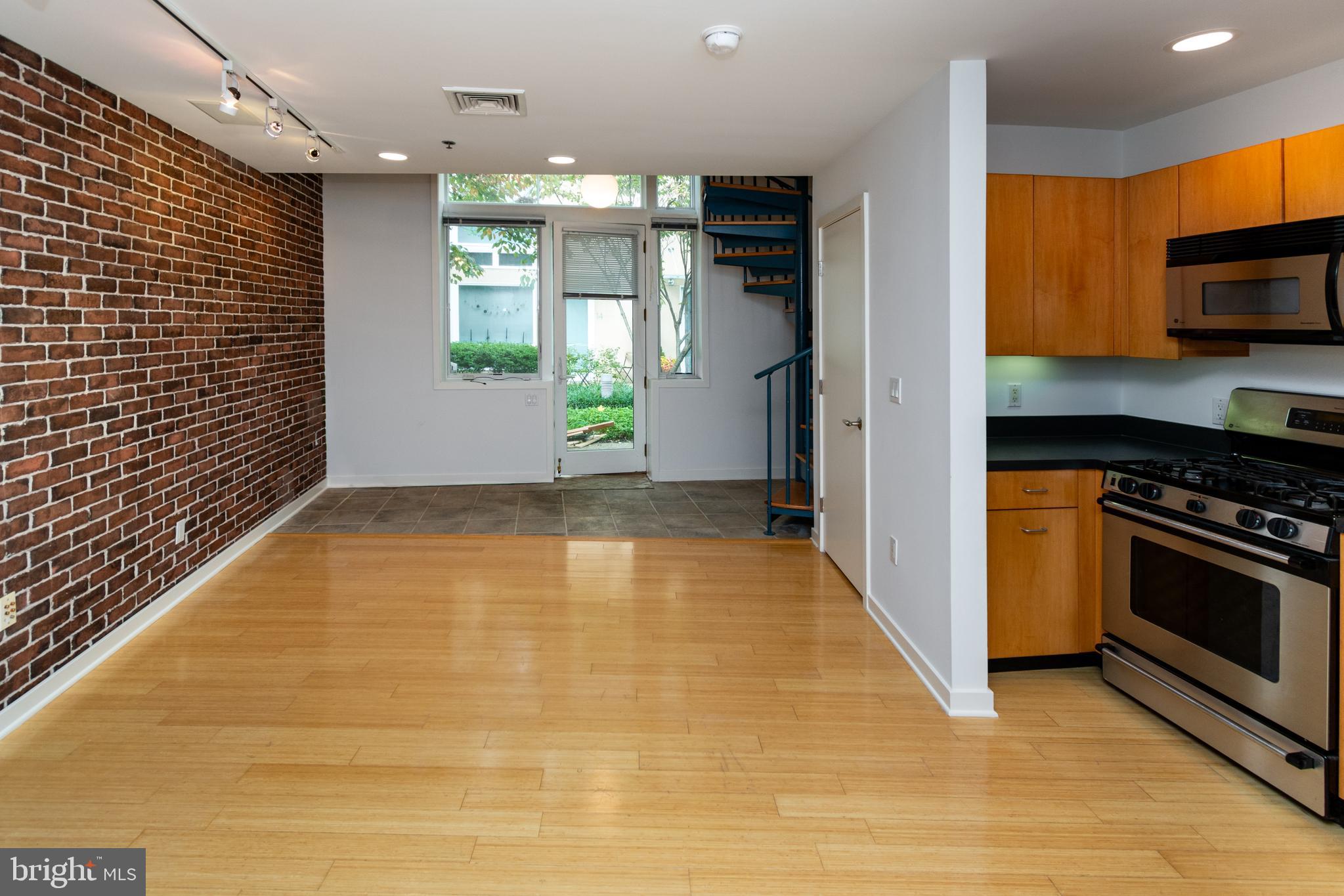 36 Moore Street, Unit 8 Princeton, NJ 08542 - Photo 32 of 35 a view of a kitchen with a sink and a stove top oven