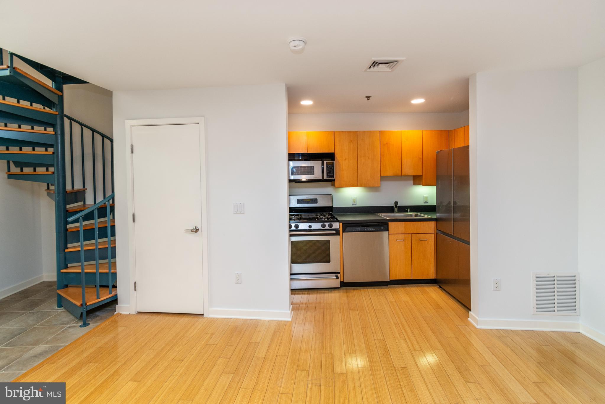 36 Moore Street, Unit 8 Princeton, NJ 08542 - Photo 33 of 35 a kitchen with stainless steel appliances a stove and a refrigerator
