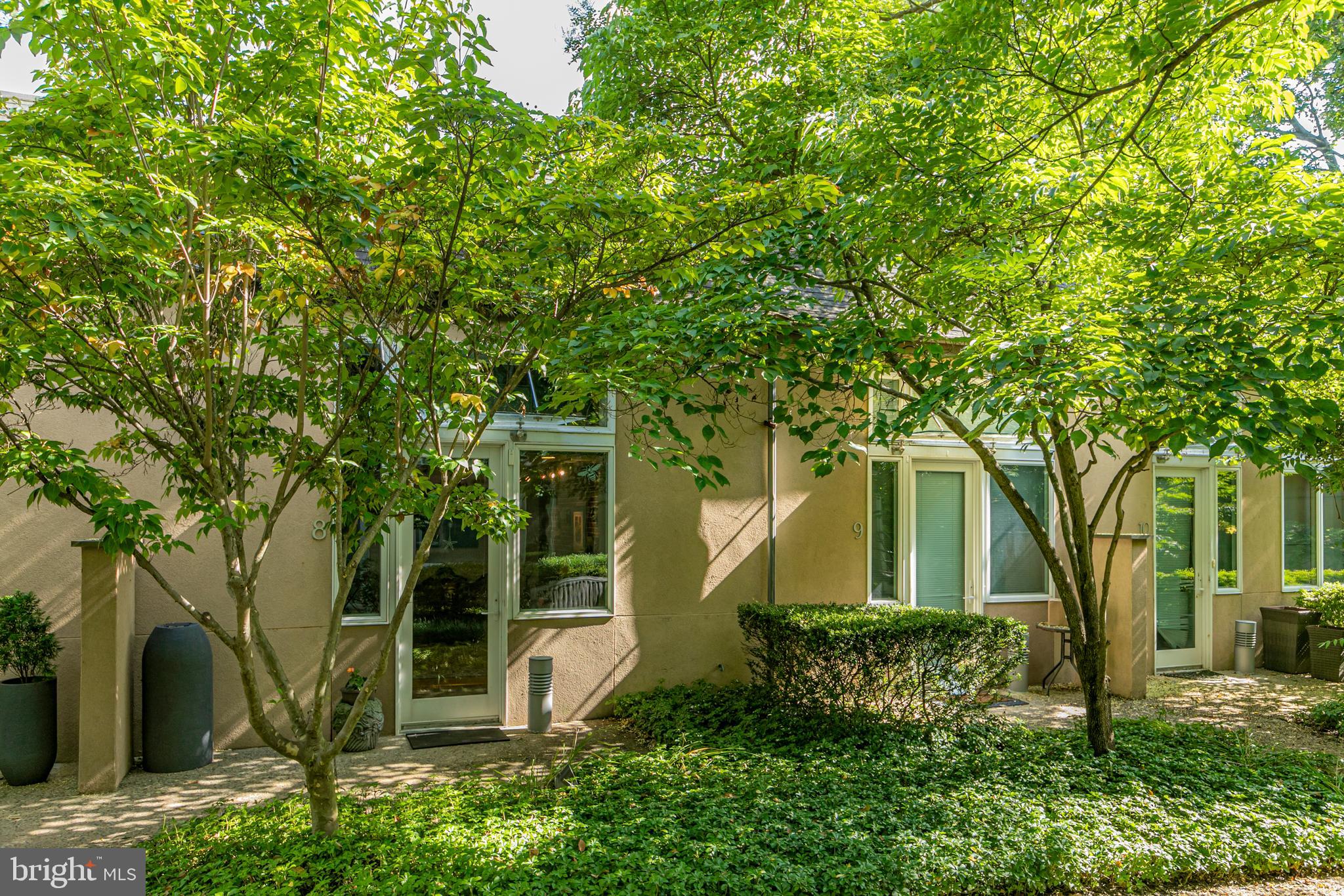 36 Moore Street, Unit 8 Princeton, NJ 08542 - Photo 4 of 35 front view of a house with a tree