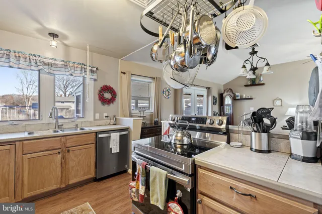 a kitchen with lots of counter top space and stove