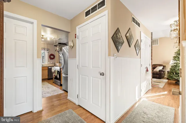 a very nice looking dining room with a table and chairs
