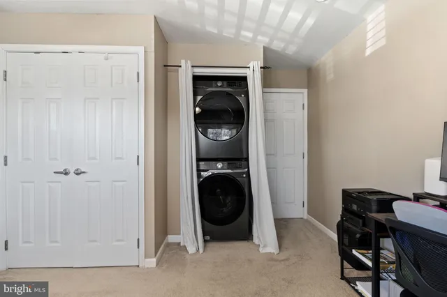 a view of a workspace with a window and washer