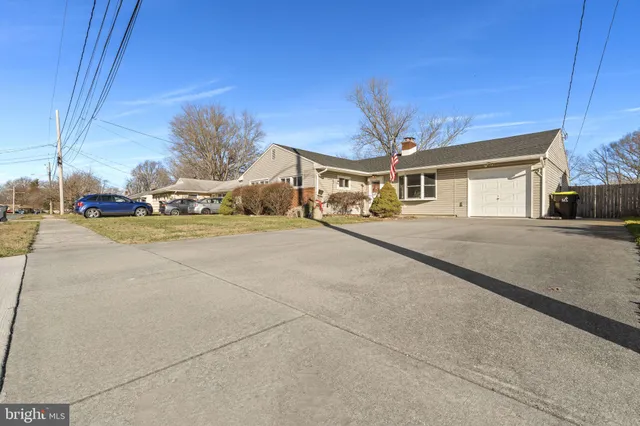 a view of a house with a street