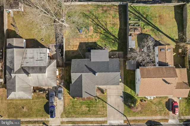 an aerial view of residential house with parking space